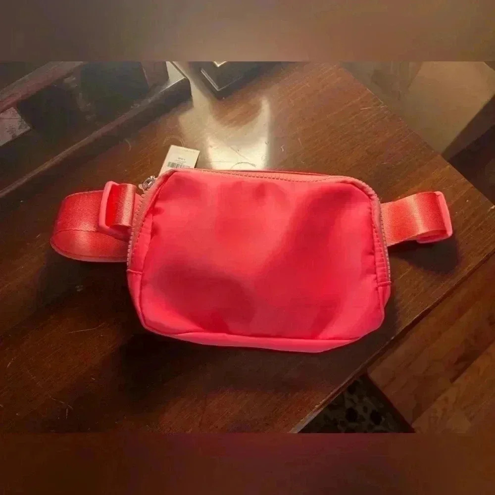 Francesca’s Neon Coral Cross Fanny NWT